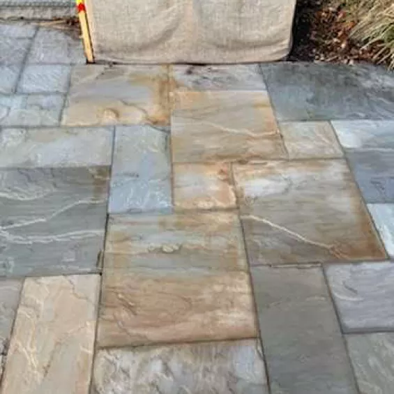 Sandblasting patio stones after